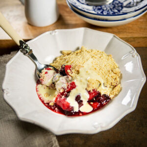 fruit crumble in a white bowl